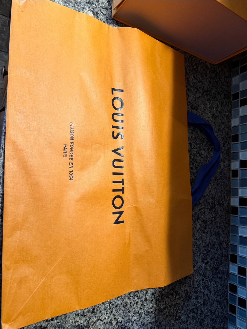 Louis Vuitton Orange Shopping Tote with Blue Handles
